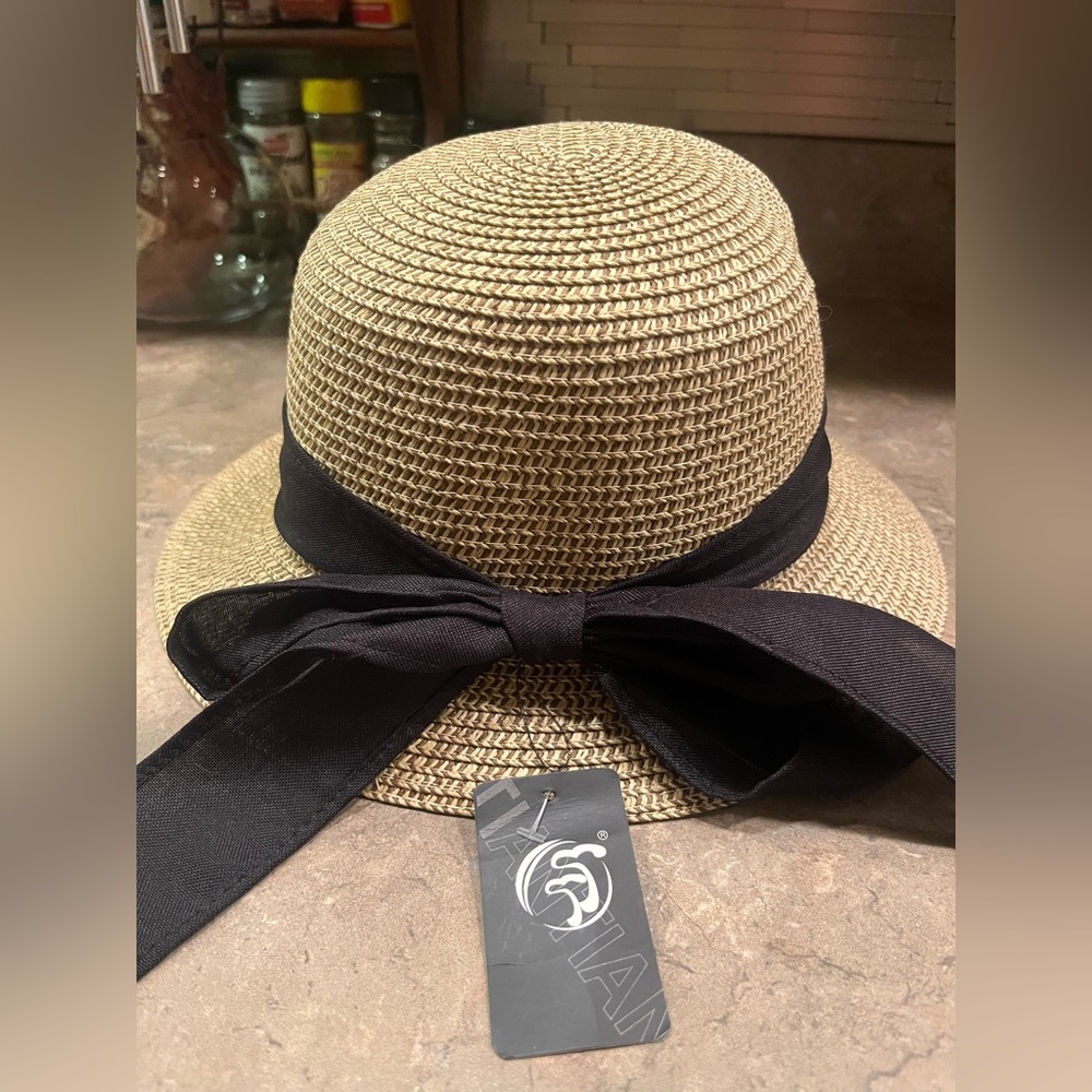 SUN HAT - TAN WITH BLACK BOW - NEW WITH TAG- NEVER WORN !!